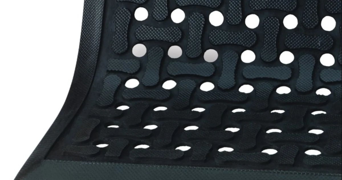 Close-up of textured anti-fatigue mat surface for industrial use